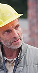 Man, team and discussion on site with construction manager, civil engineering insight and advice. Mature person, conversation and planning outdoor with building contractor, renovation and project.