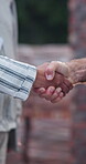 Construction, handshake or people on site with deal, introduction or approval in safety inspection. Partnership, flare or engineer with shaking hands, greeting or clearance in compliance review.