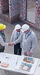 Handshake, walking and people on tablet for construction, building inspection and renovation plan. Architecture, above and workers shaking hands on tech for remodeling, agreement or layout approval
