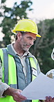 Engineer, blueprint or man talking with team at site for construction, development or layout. Architecture, paperwork and planning with mature people for building design, feedback or strategy outdoor