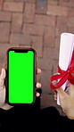 Hands, student and green screen at graduation with phone, results and diploma for academic success. Above, person and graduate at campus with mobile, mockup space and certification for learning award