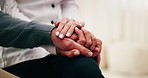Holding hands, home and old person with caregiver, comfort and wellness in health community. People, closeup and elderly patient with support, retirement or help with compassion or medical service