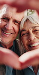 Happy, face and senior couple with heart hands for romance, love or relationship together. Portrait, elderly man and woman with smile, like emoji or shape in frame for romantic gesture in nature