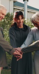 Outdoor, people and hands together with personal trainer for fitness, support and health celebration. Nature, teamwork and huddle with stack for solidarity, exercise goal or motivation for wellness