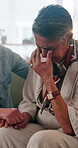 Woman, crying and holding hands in home with friends, emotional support and help for healing from loss. Sad, mature people and tears in living room with trust, understanding and empathy for grief.