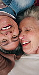 Senior, women and friends laughing with smile above for funny joke, humor or bonding together. Top view, elderly or happy female people lying with comedy for social interaction, moment or memory