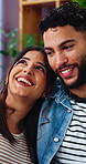 Conversation, couple and love on sofa with smile, bonding and gossip in living room. Embrace, happy man and woman with communication in house with relationship, relax or chat in home with support