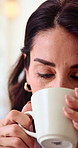 Calm, drinking and business woman in coffee shop for thinking, inspiration and reflection on break. Cafe, happy and person with latte, cappuccino and idea for project decision, choice and perspective