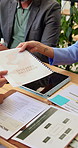 Discussion, laptop and hands of business people in cafe with documents for investment planning. Meeting, computer and team of financial advisors with paperwork for finance report in coffee shop.