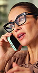 Phone call, spectacles and businesswoman in office at night with communication for finance negotiation. Cellphone, deadline and mature financial manager on mobile discussion for investment feedback.