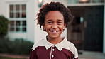 Face, child and happy outdoor at new house, property purchase and neighborhood for relocation. Portrait, smile and kid for future security, residential lease and moving in for real estate investment