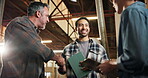Men, handshake and carpenter group in warehouse with support, tech or happy for project development. Teamwork, people and shaking hands in timber factory for collaboration, cooperation or feedback