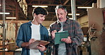 Carpentry, clipboard and tablet with men in warehouse together for discussion or update. Agenda, schedule and walking with people in woodworking factory for inventory management of stock order