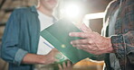 Carpentry, hands and tablet with men in warehouse together for planning, research or update. App, collaboration and discussion with people in woodworking factory for conversation, report or review