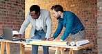Architect, drawing and men with laptop in building, discussion and planning for property development. Civil engineering, blueprint and people with technology on construction site, teamwork and ideas