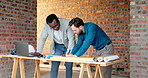 Architect, drawing and men with blueprint in building, talking and planning for property development. Civil engineering, paperwork and people with technology on construction site, teamwork and sketch
