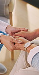 Women, nurse and holding hands with senior for healthcare support, trust or understanding in home. Female people, health worker or caregiver with empathy for elderly care, medical advice or help