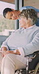 Senior, nurse and woman with wheelchair in home for healthcare, assisted living or support. Health worker, caregiver or helping female person with a disability for elderly care or mobility in house