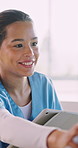 Nurse, tablet or happy woman with patient in home for medical checkup, consultation or advice. Female person, caregiver or healthcare worker talking with smile or technology for health visit in house