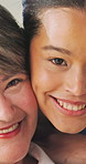 Senior, face and nurse with happy woman for medical help or healthcare service in retirement home. Portrait, female people or caregiver with smile or hug for elderly care, assistance or love in house