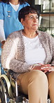 Nurse, push and old woman in retirement home with wheelchair, support and treatment for rehabilitation. Caregiver, help and senior person with disability, healthcare assistance and injury recovery.