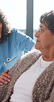 Senior, woman and talk in retirement home with caregiver, healthcare support and feedback for wellness. Pensioner, person and nurse in house with conversation, kindness and trust for medical advice.