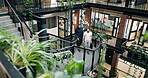 Business people, discussion and feedback on office stairs for property development, report or proposal. Above, broker and realtor on steps for planning, chat or valuation at real estate agency