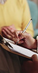 People, hands or therapist writing with patient for counseling, therapy session or helpful advice. Counsellor, client or taking notes with clipboard or listening skill for mental health or support
