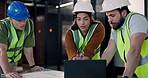 Architect, planning and construction team with blueprint, laptop and maintenance strategy. People, engineer and discussion with computer for building codes, design document and flare in office