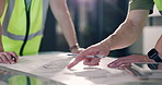 Architect, hands and construction team with blueprint, planning or maintenance evaluation. Document, engineer and discussion with floor plan for building, design strategy and people in office