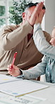 Child, learning and high five with dad in home, embrace and happy for academic success or motivation. Family, studying and celebration for achievement, mature man and hug with daughter and education