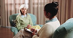 Therapist, writing and old woman in consultation with clipboard, discussion and survey for wellness. Senior person, conversation and psychologist in office with therapy, support and checklist notes.