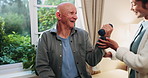 Physiotherapist, exercise and old man in clinic with dumbbell, rehabilitation and laugh for funny joke. Happy, senior person and physical therapist talk with humor, weights and workout for wellness.