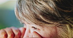 Sad, elderly and woman with tears in home for past moment, memory loss or grief for loneliness. Emotional, widow or senior female person wiping eye for reflection, nostalgia or mourning in house