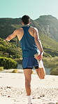 Fitness, stretching and back of man outdoor for exercise, training and prepare for workout. Nature, morning and person with warm up for wellness, leg mobility or health for balance or muscle strength