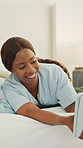 Happy, selfie or black family with tablet in bed for holiday, picture or bonding together in home. Mom, dad and children with smile or technology in bedroom for photography or capture moment in house