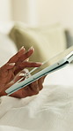 Woman, hands or bed with tablet for network, social media or internet connectivity in home. Female person, relax or scrolling with technology in bedroom for online web browsing or connection in house