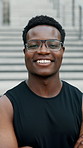 Fitness, face and black man in city with confidence for outdoor exercise, health or wellness. Portrait, active or male person with smile, pride or arms crossed for physical wellbeing in an urban town