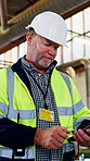 Mature, man and inspector with phone at warehouse for communication, construction and inspection. Typing, building site and person at work with productivity, technology and report on compliance