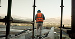 Back, man and engineer at site for construction, inspection and safety check for architecture. Male person, walking or rooftop with ppe, quality assurance and progress of building development in city