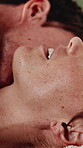 Couple, love and neck kiss on bed with sex, desire and foreplay or romance touch for lust in home. People, bedroom and bonding on valentines day for marriage, lovers and erotic intimacy after date