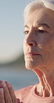 Meditation, yoga and senior woman with prayer hands for holistic wellness, mindfulness and fitness. Namaste, yogi and person with spiritual exercise in retirement, inner peace and breathing outdoor