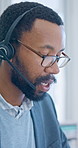 Headset, black man and call center consultant in office with online enquiry, FAQ or consultation. Typing, mic and technical support agent in workplace with help desk, crm or customer service.