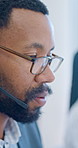 Headset, black man and call center agent in office with online enquiry, FAQ or consultation. Professional, mic and technical support consultant in workplace with help desk, crm or customer service.