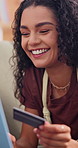 Laptop, sofa or happy woman with credit card for online shopping, banking app or payment in home. Female person, relax or shopper with debit or computer for wireless transaction or ecommerce in house