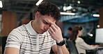 Tired, business and man in office with headache, workload and burnout for financial loss. Employee, migraine and coworking in workplace with laptop, mental fatigue and vertigo for investment mistake