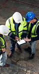 Above, architect and team at construction site with tablet screen, blueprint or AI project rendering. Manager, people and discussion in building with technology, architecture and digital floor plan.