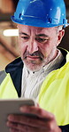 Man, engineer and tablet in workshop for planning, stock order or app for work schedule. Mature project manager, tech or reading in factory for efficient production, manufacturing timetable or report