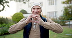 Elderly, face and happy man with heart hands in garden for retirement, love or outdoor romance. Portrait, senior or male person with smile, like emoji or romantic gesture for passion, support or care