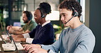 Call center, man and laptop with coworking in office, contact us and communication with help desk. Person, colleagues and typing at pc for online advice, customer support and telecom in workplace